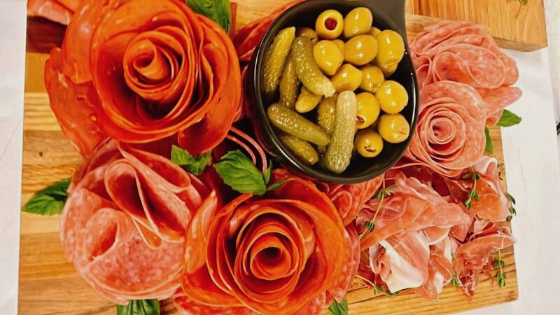 Artisan charcuterie board with premium cheeses and cured meats