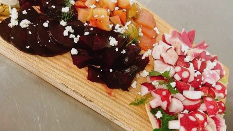 Charcuterie board with gourmet accompaniments