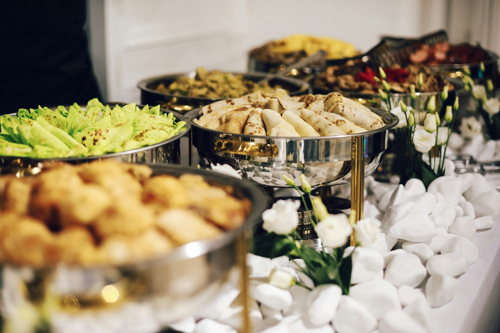 Beautiful catering spread with various elegant dishes and professional presentation